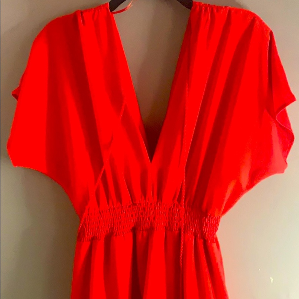 Long red dress.